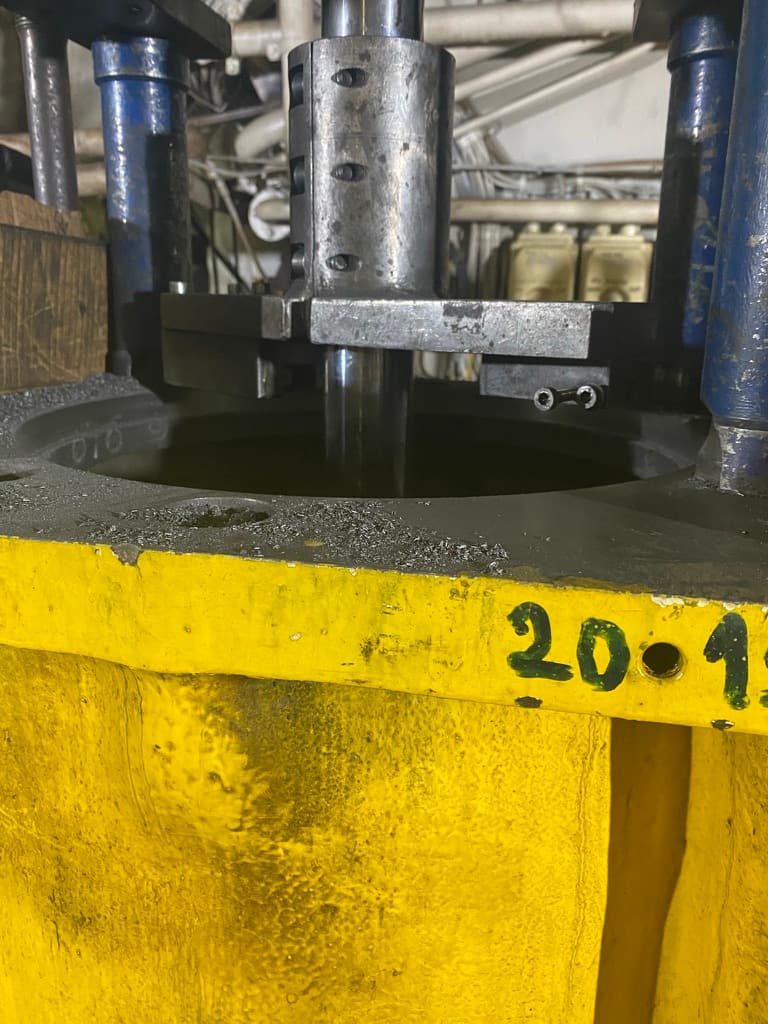 Close-up of precision boring work on a marine engine cylinder block