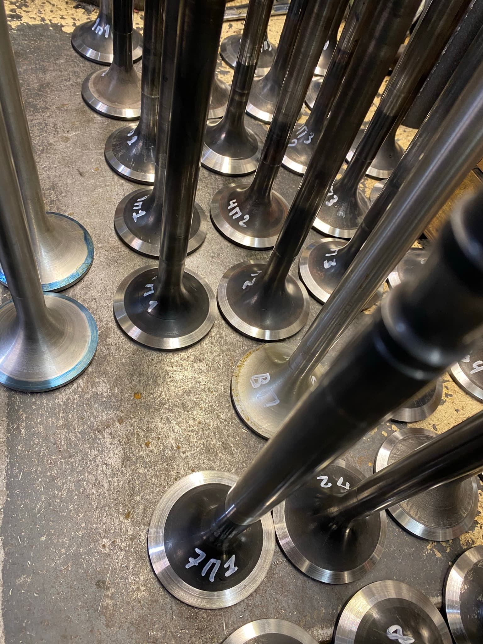 Marine engine valves prepared for inspection and fitting