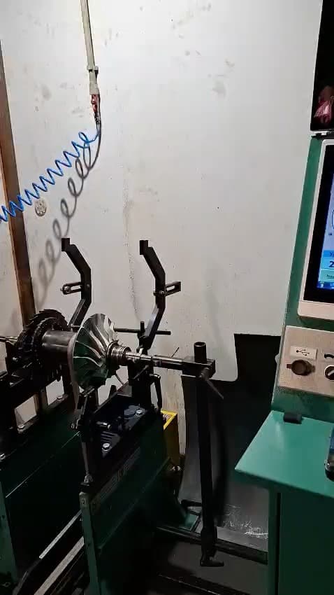 Marine turbocharger rotor mounted on a balancing machine